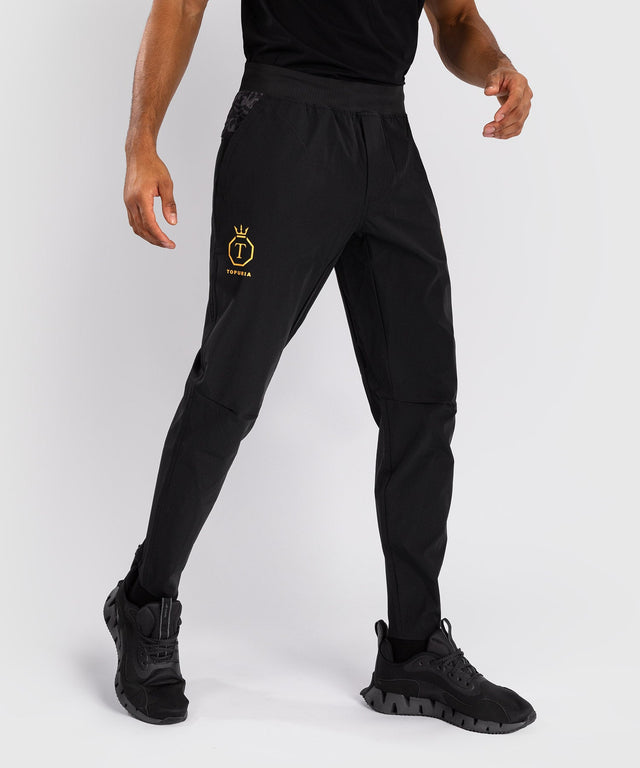 Venum x Topuria Unmatched Jogging-Hose – Schwarz/Gold