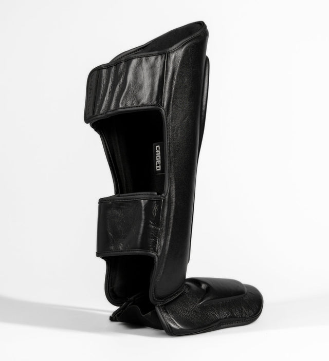 Caneleiras Caged Kickboks 'X' Series – Preto/Preto