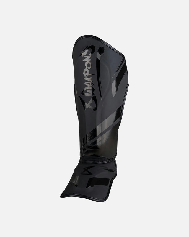 8 WEAPONS Skinnebensbeskyttere Shift – Sort