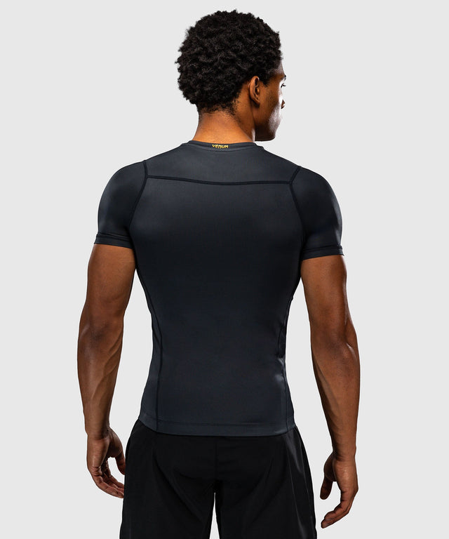 Rashguard Venum Attack Manches courtes – Noir/Or