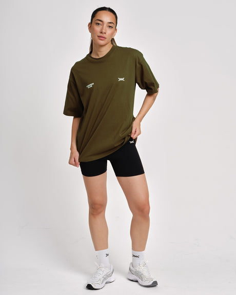 Camiseta Caged Training Club – Caqui verde mujer