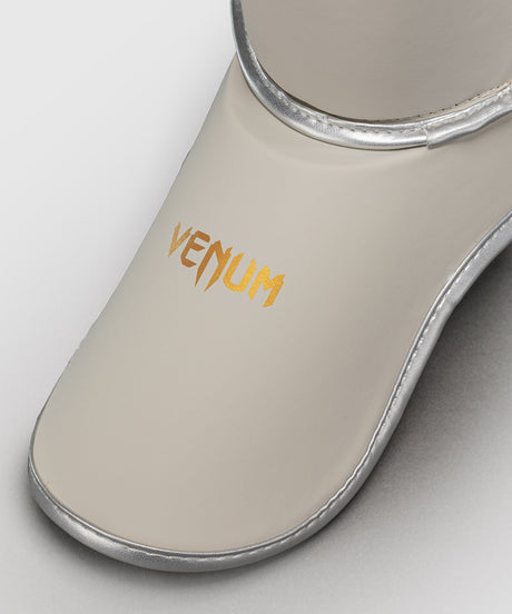 Venum Schienbeinschoner Contender 1.5 – Elfenbein/Gold