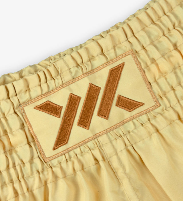Spodenki Muay Thai Caged Classic – Brzoskwiniowe
