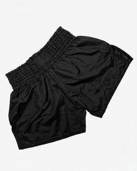 Caged Muay Thai Shorts Classic – Black/Black flat lay