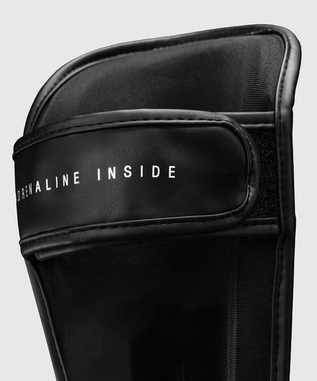 Venum Schienbeinschoner Contender 1.5 – Schwarz/Weiß