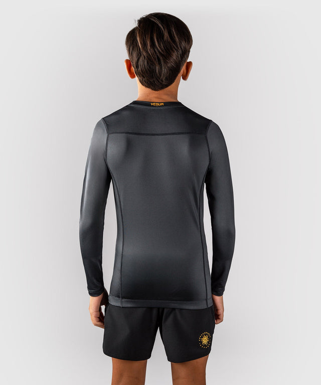 Venum Attack Long Sleeve Rashguard Kids – Black/Gold