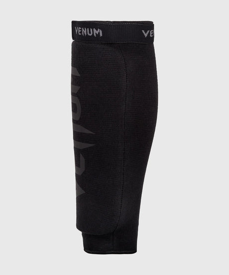 Venum Kickbox Schienbeinschoner Kontact ohne Fuß – Schwarz/Schwarz