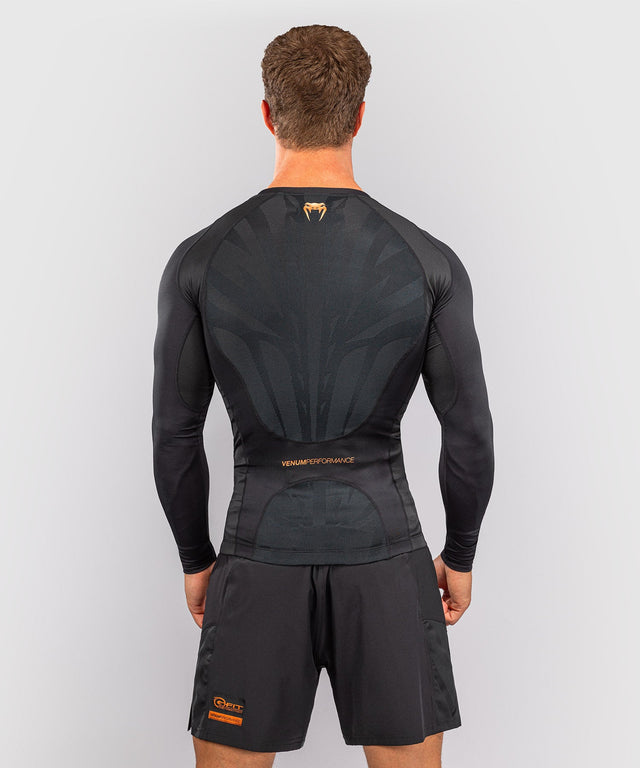 Rashguard Venum G-Fit Revolution Manga Larga – Negro/Cobre