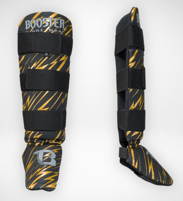 Paratibie da kickboxing Booster Combat Bambini – Nero/Giallo