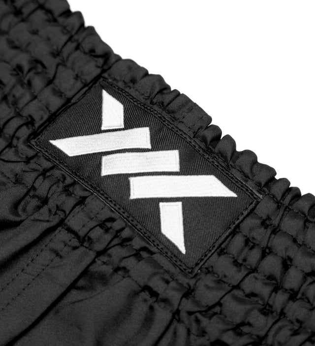 Caged Muay-Thai-Shorts Classic – Schwarz/Weiß Damen
