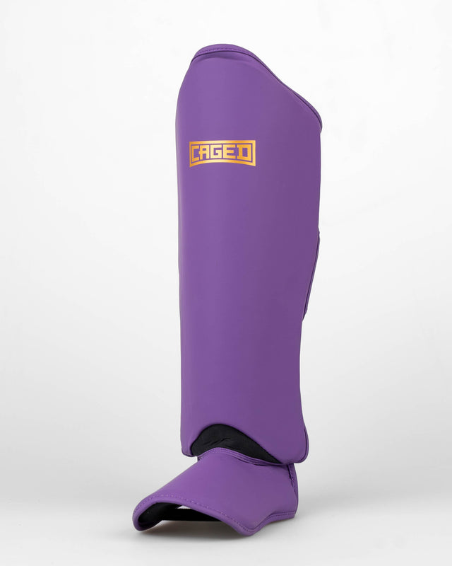 Caneleiras Caged Shadow – Roxo/Ouro