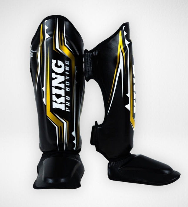 King Pro Boxing Schienbeinschoner Spartan – Schwarz/Gelb
