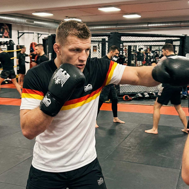 Koszulka treningowa Phantom Athletics EVO+ Germany EC – Biała/Czarna/Czerwona/Złota