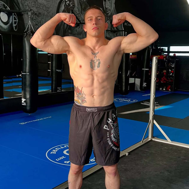 Spodenki MMA Phantom Athletics EVO Tiger Unit – Czarne/Tiger