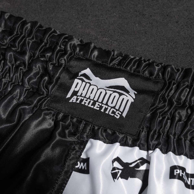 Pantaloni scurți Muay Thai Phantom Athletics Legend – Negru/Alb