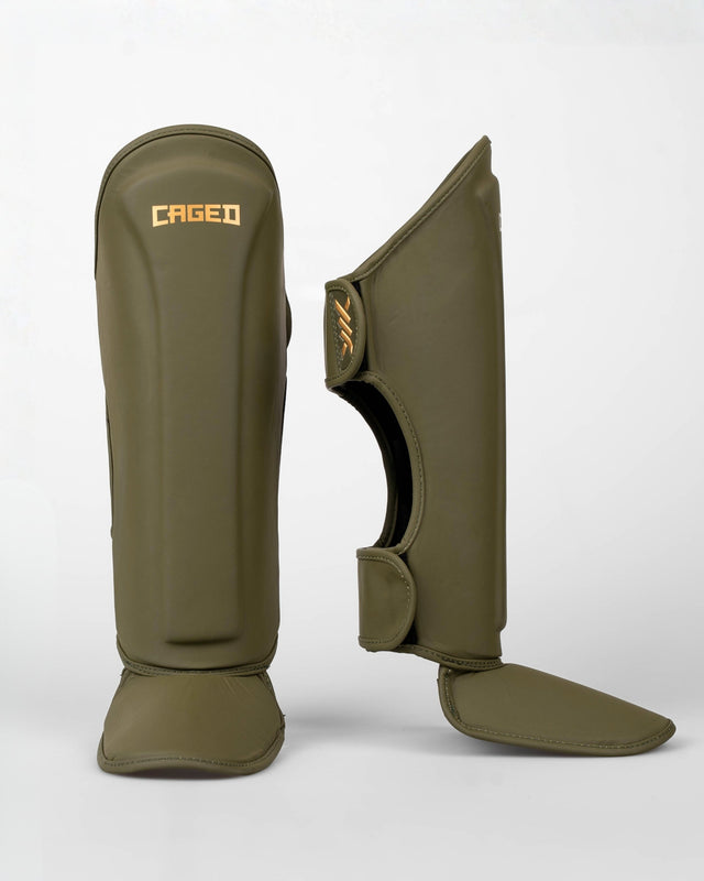 Caneleiras Caged Spark Criança – Caqui/Ouro
