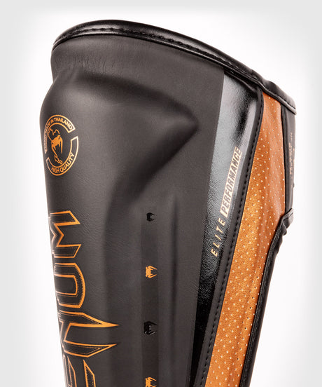Venum Schienbeinschoner Kickbox Elite Evo – Schwarz/Bronze