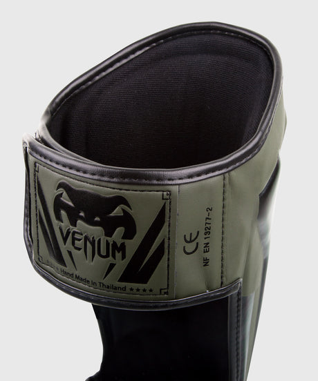 Venum Schienbeinschoner Elite – Grün/Schwarz