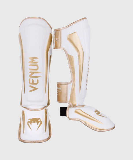 Caneleiras de kickboxing Venum Elite – Branco/Ouro