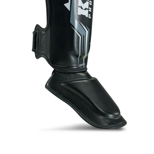 King Pro Boxing Kickboks Scheenbeschermers Spartan - Zwart/Grijs