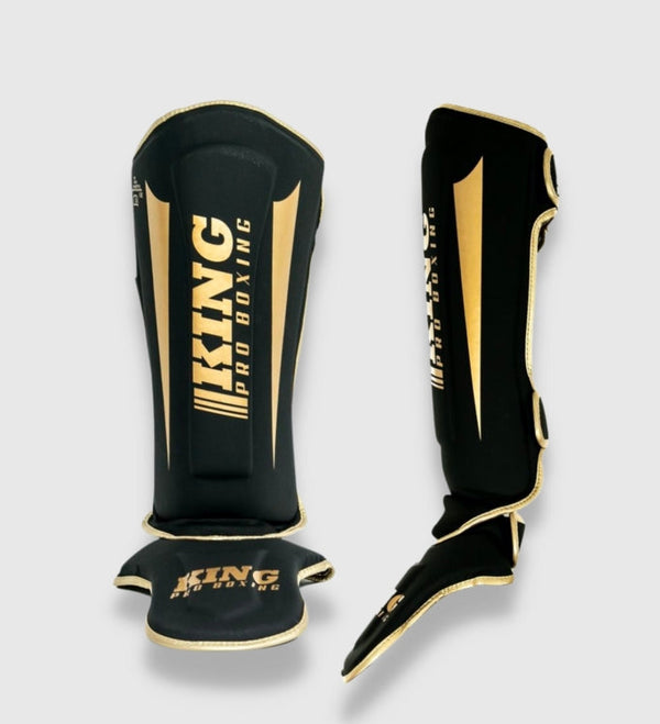 King Pro Boxing Schienbeinschoner Revo – Schwarz/Gold