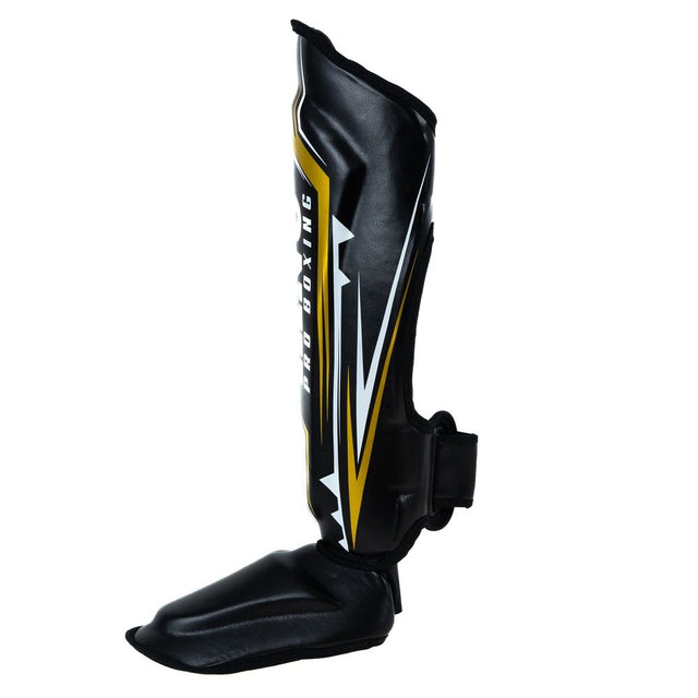 King Pro Boxing Schienbeinschoner Spartan – Schwarz/Gelb