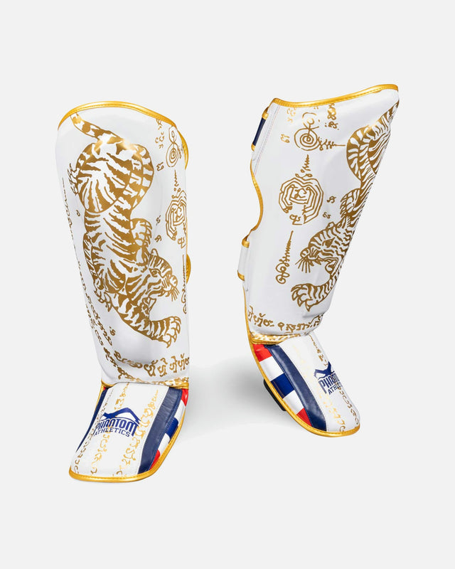 Paratibie Phantom Athletics Muay Thai – Bianco/Oro