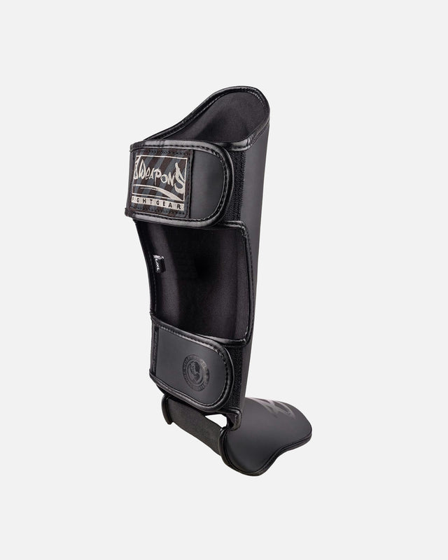 Espinilleras 8 WEAPONS Unlimited 2.0 – Negro