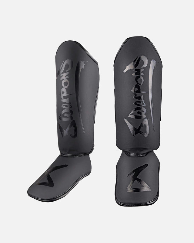Espinilleras 8 WEAPONS Unlimited 2.0 – Negro