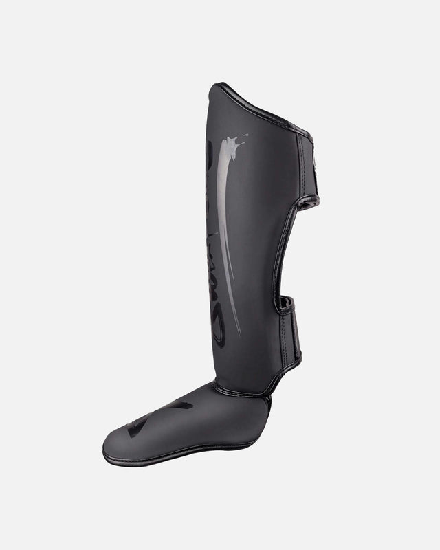 Espinilleras 8 WEAPONS Unlimited 2.0 – Negro