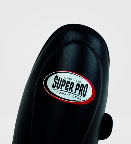 Caneleiras de kickboxing Super Pro Thai Pro Pele – Preto – Caneleiras